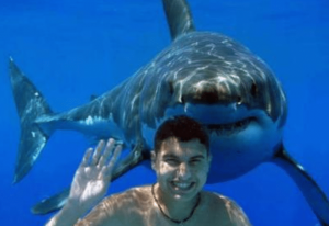 Happy Dude waving with imminent shark attack